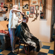Natasha getting a haircut from a friend who specializes in LGBT clients (Saint Petersburg, May 2013).